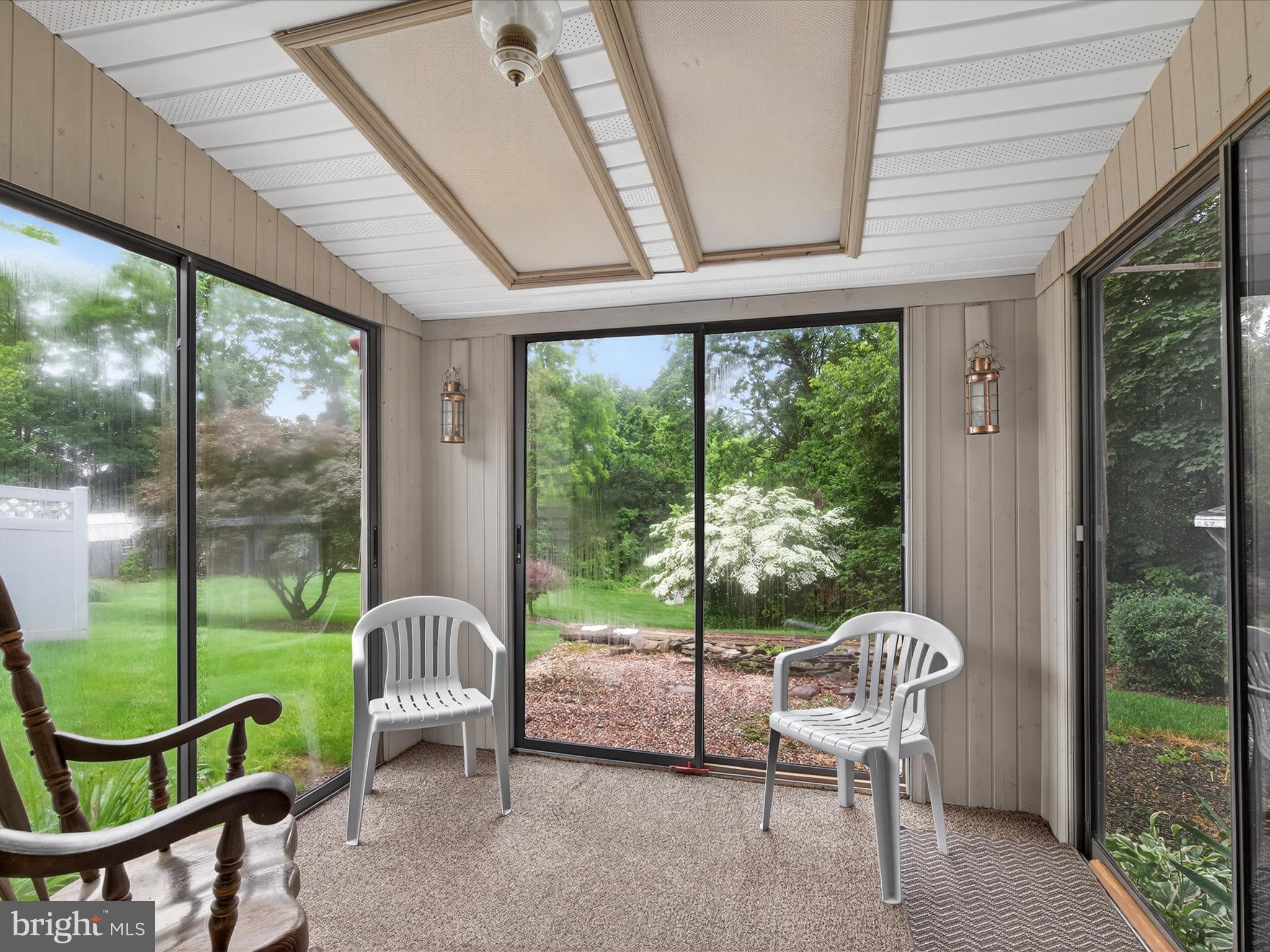 203 Pleasant Hill Drive Lititz, PA 17543 - Photo 28 of 46 a view of a porch with furniture and garden