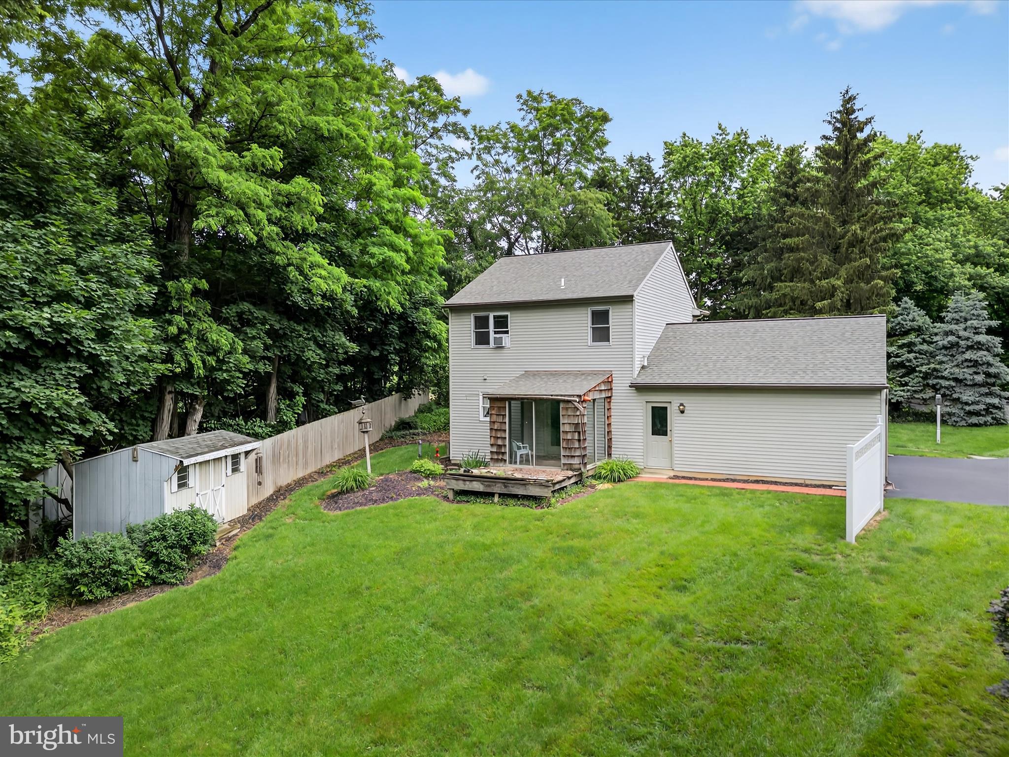 203 Pleasant Hill Drive Lititz, PA 17543 - Photo 31 of 46 a view of a house with a yard and sitting area