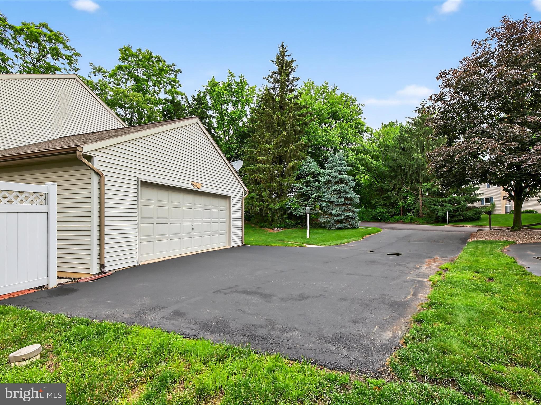 203 Pleasant Hill Drive Lititz, PA 17543 - Photo 34 of 46 a view of a house with a yard and garage