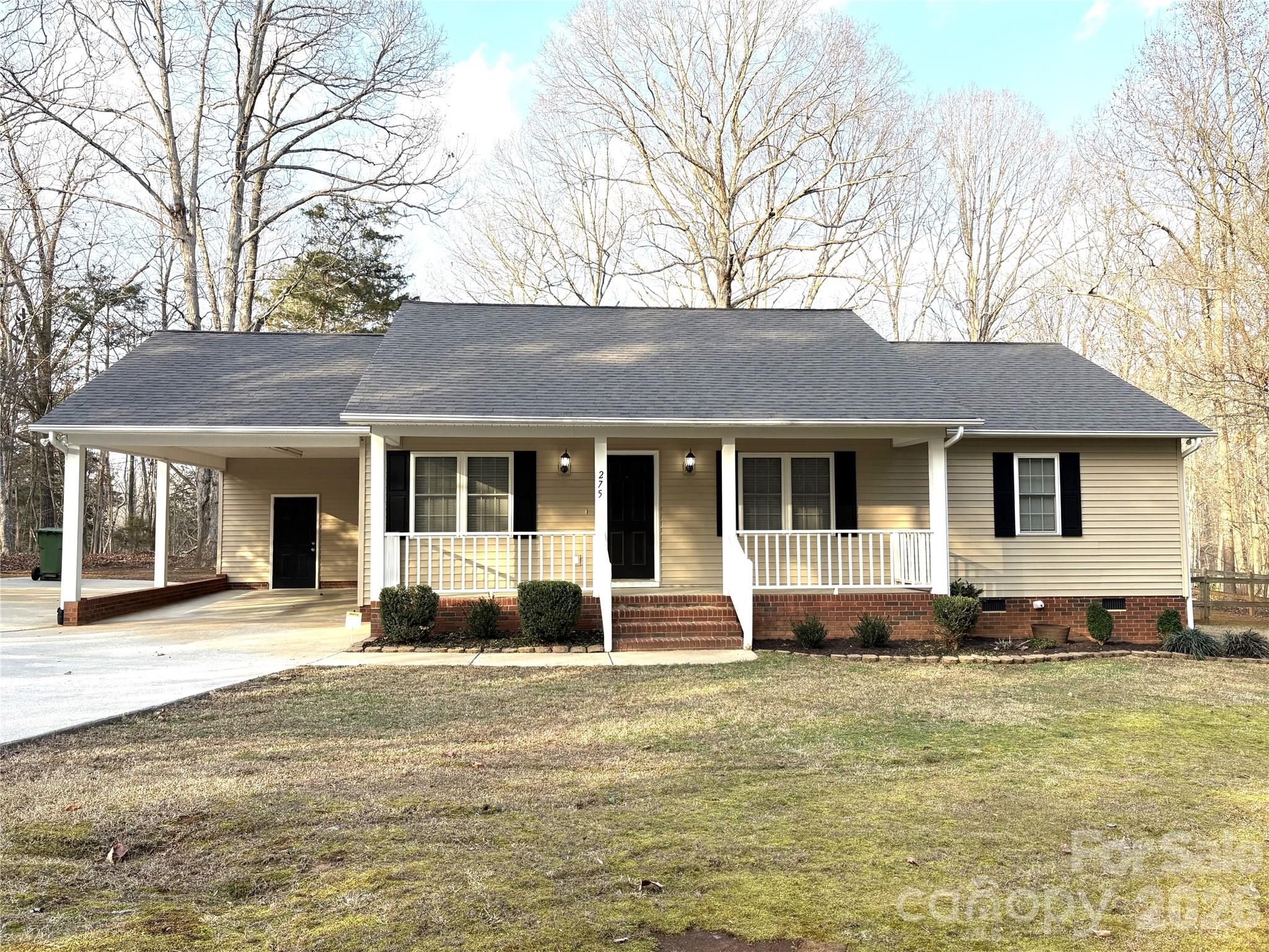 275 Holiday Road Lancaster, SC 29720 - Photo 1 of 8 a front view of a house with a yard