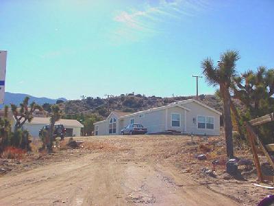 a view of a house with a mountain view