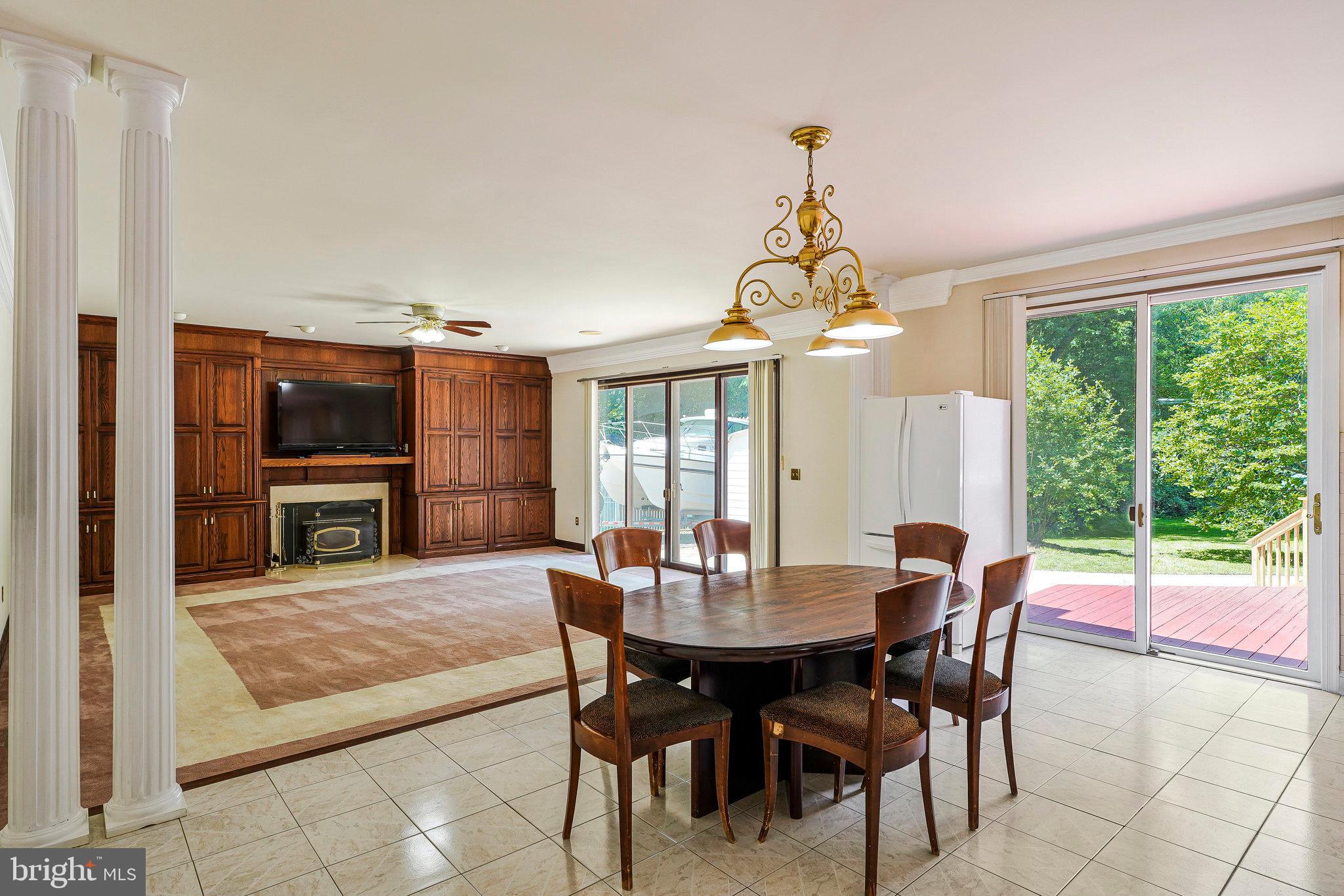 8652 Tuttle Road Springfield, VA 22152 - Photo 2 of 102 a view of a dining room with furniture window and outside view