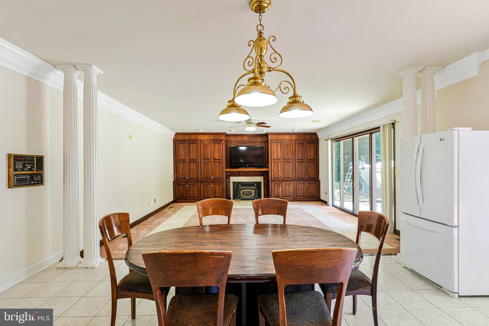 8652 Tuttle Road Springfield, VA 22152 - Photo 26 of 102 a view of a dining room with furniture
