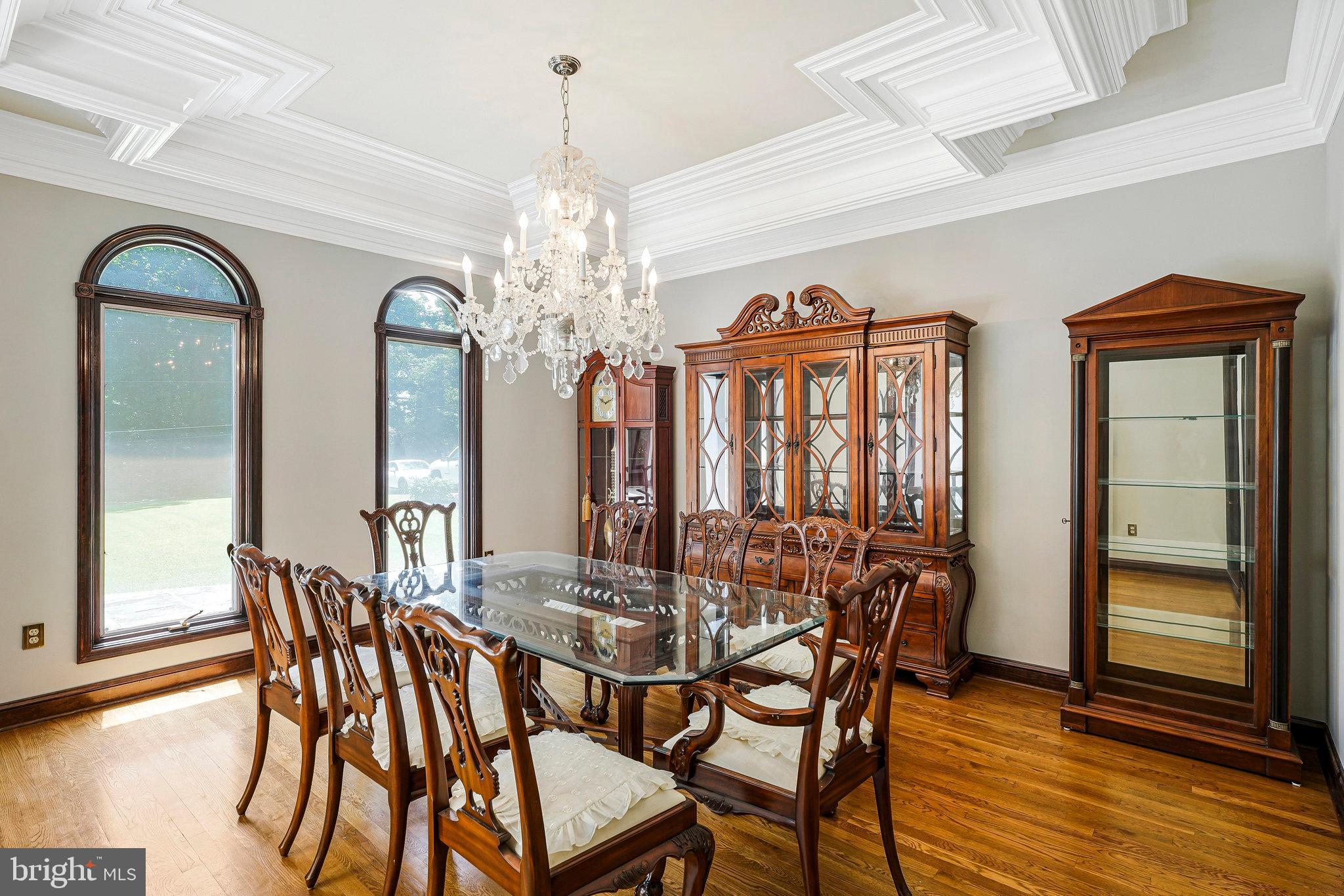8652 Tuttle Road Springfield, VA 22152 - Photo 28 of 102 a view of a dining room with furniture window and wooden floor