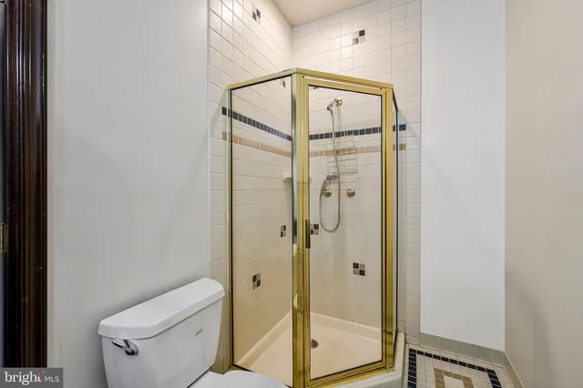 a room with pool table and window