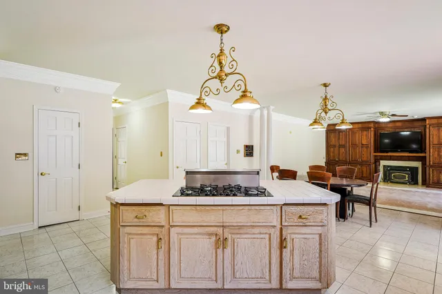 a bathroom with a sink mirror and vanity