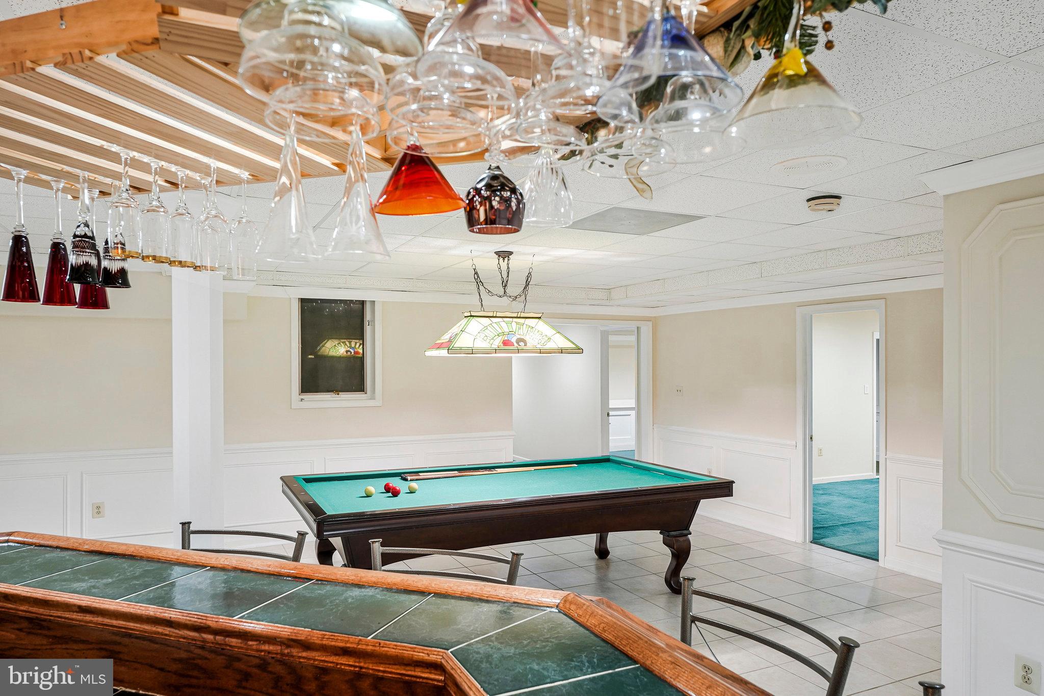 8652 Tuttle Road Springfield, VA 22152 - Photo 81 of 102 a room with pool table and window