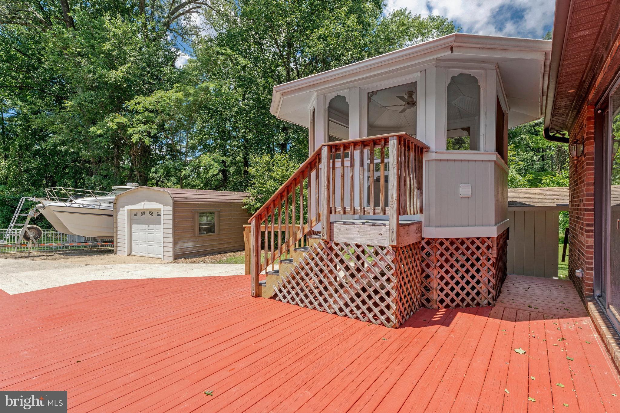 8652 Tuttle Road Springfield, VA 22152 - Photo 89 of 102 a front view of a house with parking space