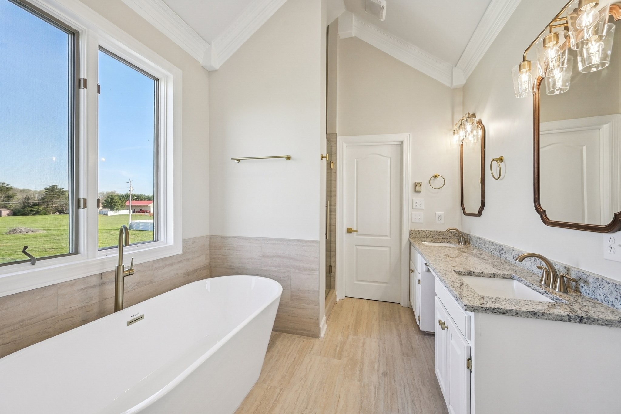 3032 Highway 49 Pleasant View, TN 37146 - Photo 12 of 19 a bathroom with a granite countertop tub sink and mirror