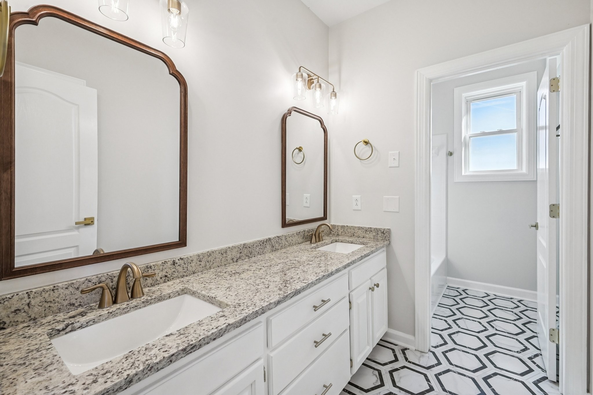 3032 Highway 49 Pleasant View, TN 37146 - Photo 14 of 19 a bathroom with a granite countertop sink and a mirror