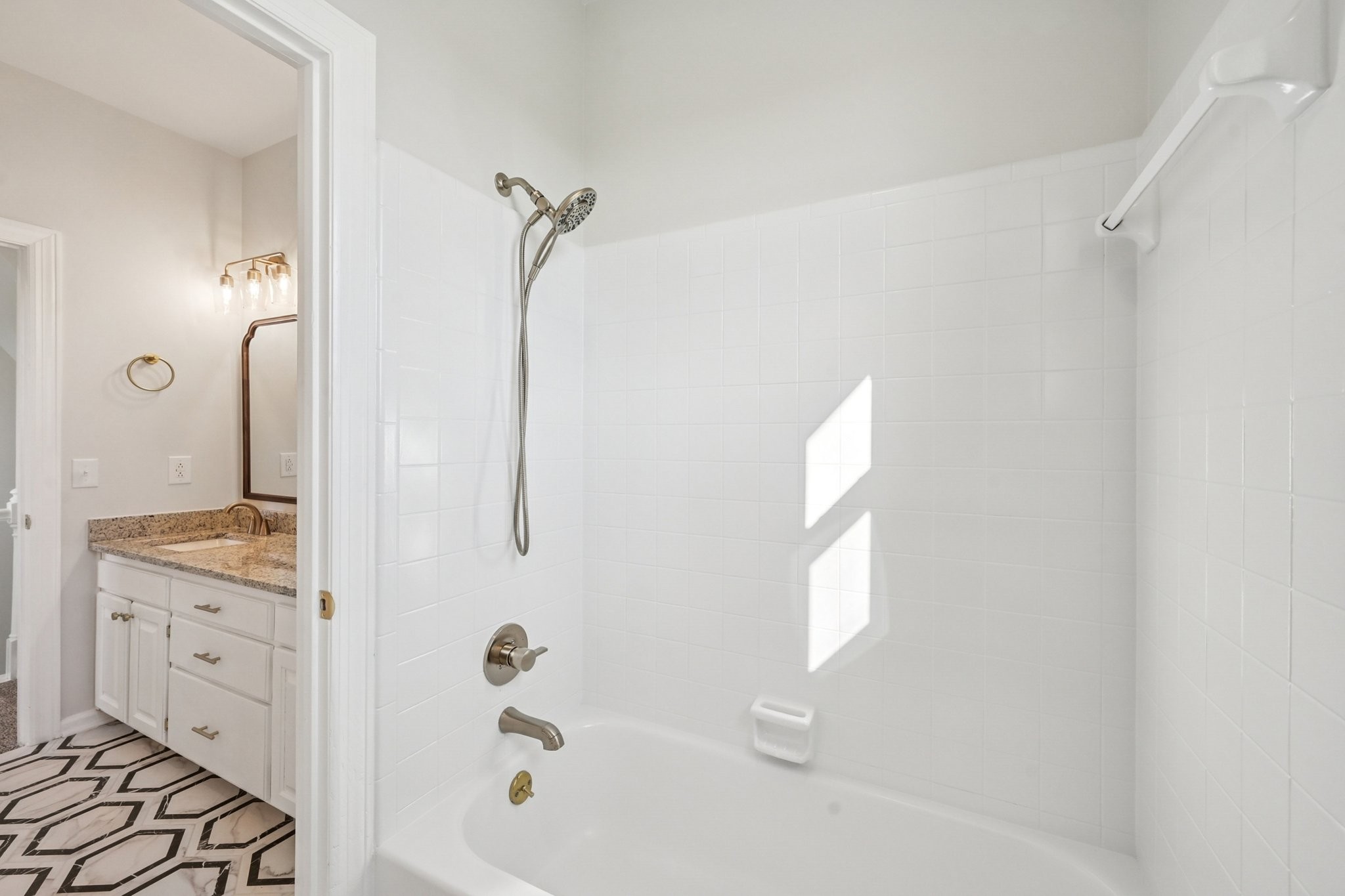 3032 Highway 49 Pleasant View, TN 37146 - Photo 15 of 19 a bathroom with a tub shower vanity and a sink