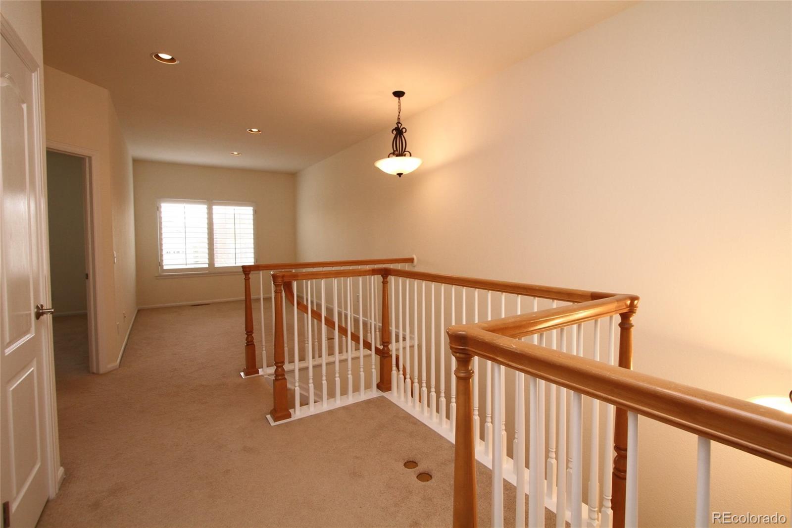 9489 Cedarhurst Lane, Unit B Highlands Ranch, CO 80129 - Photo 13 of 20 a view of a hallway with entryway