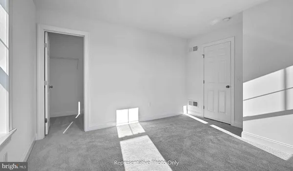 a picture of a wall with a bench