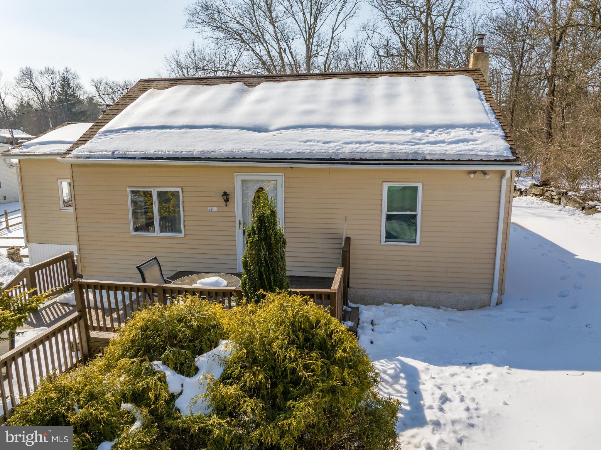 2013 Walters Road Green Lane, PA 18054 - Photo 21 of 26 Charming home nestled in a snowy landscape.