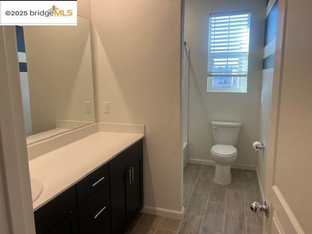 5464 Gallier Loop Antioch, CA 94531 - Photo 11 of 11 a bathroom with a sink a toilet and a window