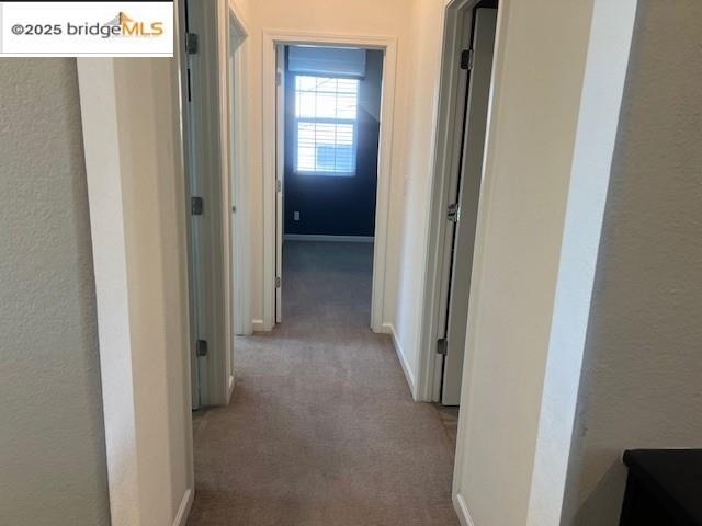 5464 Gallier Loop Antioch, CA 94531 - Photo 7 of 11 a view of a hallway with wooden floor