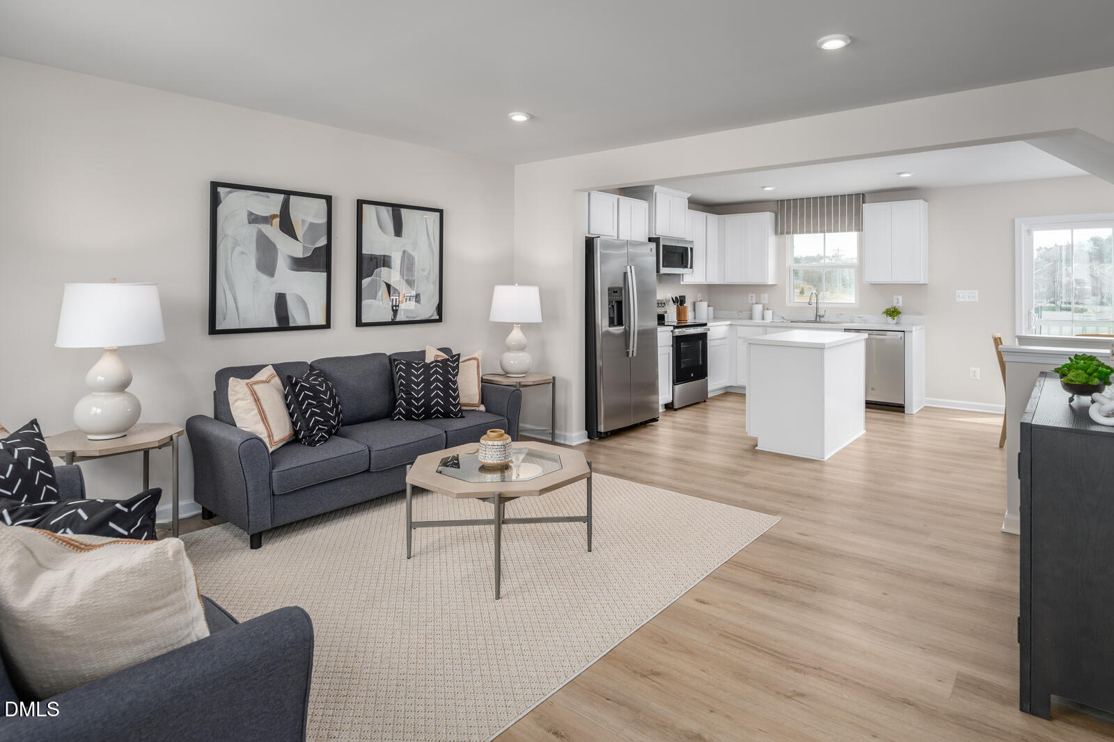 1233 Rollman Farm Road Raleigh, NC 27603 - Photo 9 of 24 a living room with furniture and kitchen view