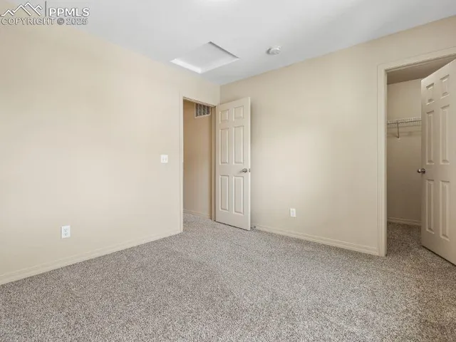 a view of a house with backyard and porch