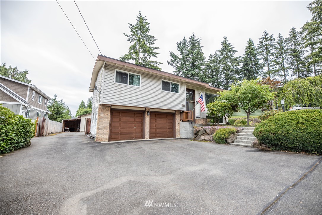 23816 Brier Road Brier, WA 98036 - Photo 2 of 39 a view of a house with a patio and a yard