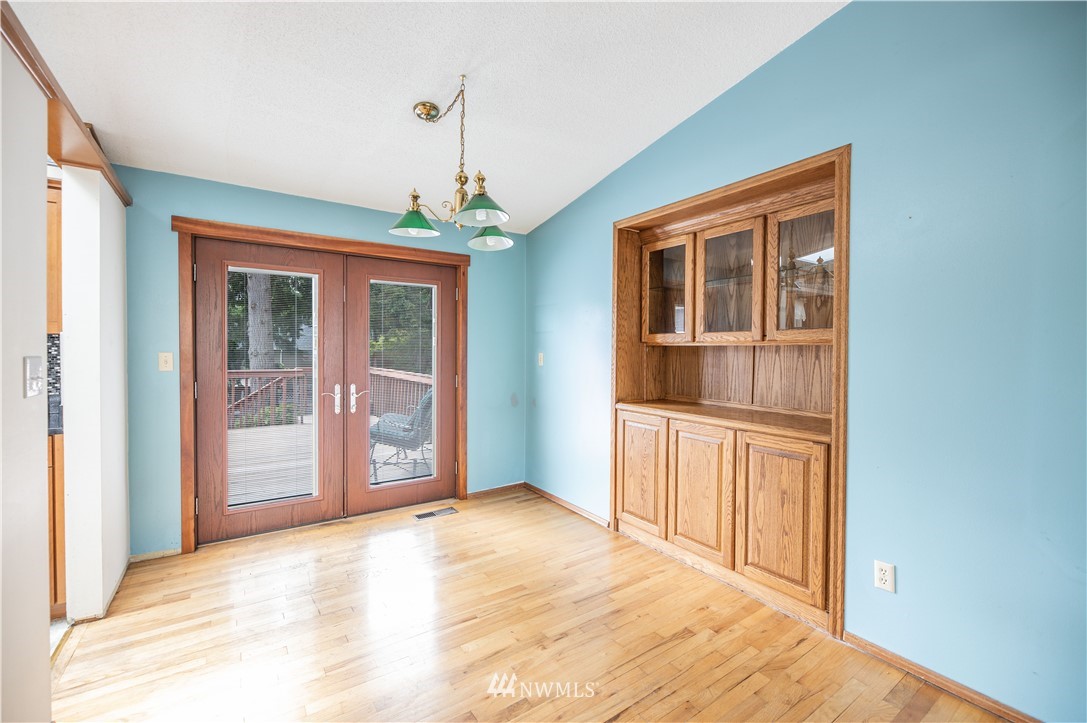 23816 Brier Road Brier, WA 98036 - Photo 12 of 39 a view of an empty room with window and cabinet