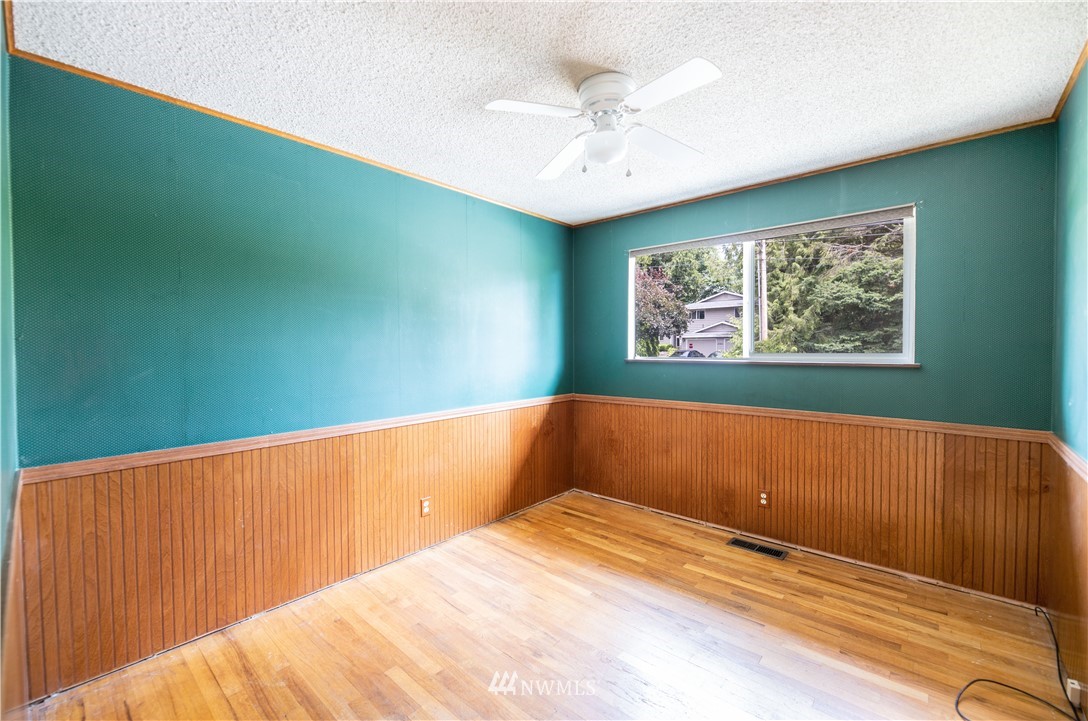 23816 Brier Road Brier, WA 98036 - Photo 20 of 39 a view of room with window and ceiling fan