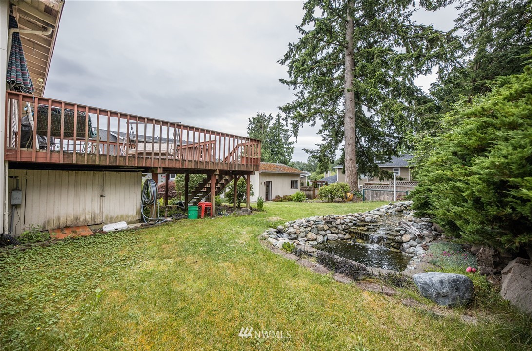 23816 Brier Road Brier, WA 98036 - Photo 30 of 39 a view of a house with a yard