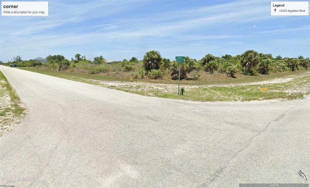 14333 Appleton Boulevard Port Charlotte, FL 33981 - Photo 3 of 5 a view of a big yard with large trees