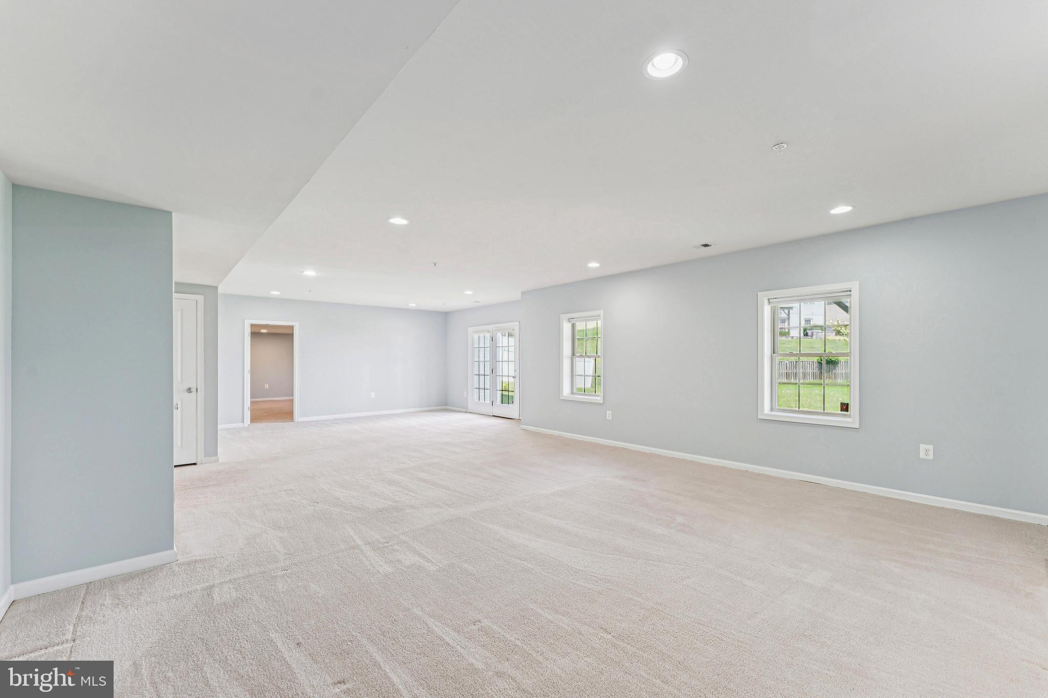 1105 Verbena Court Silver Spring, MD 20906 - Photo 52 of 79 Amazing Rec room with windows and walk out.