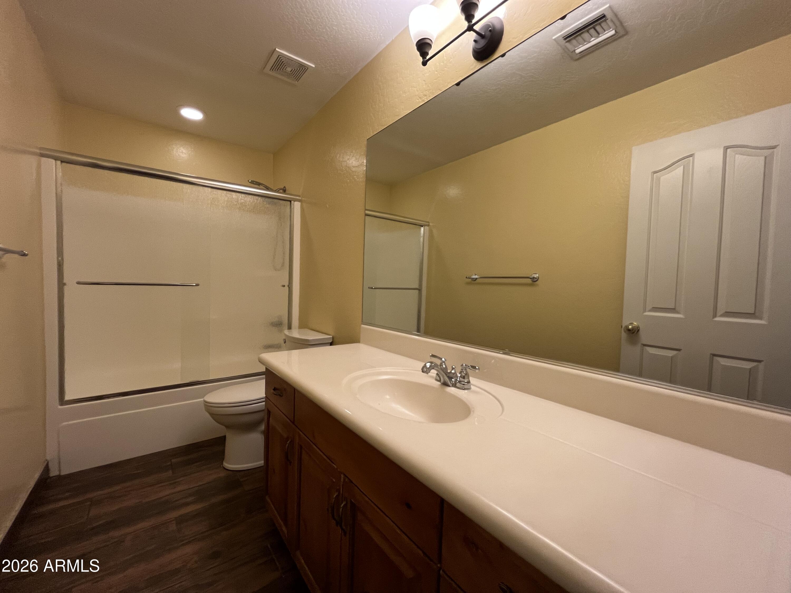 802 East Roberts Road Phoenix, AZ 85022 - Photo 22 of 33 a bathroom with a sink and a mirror
