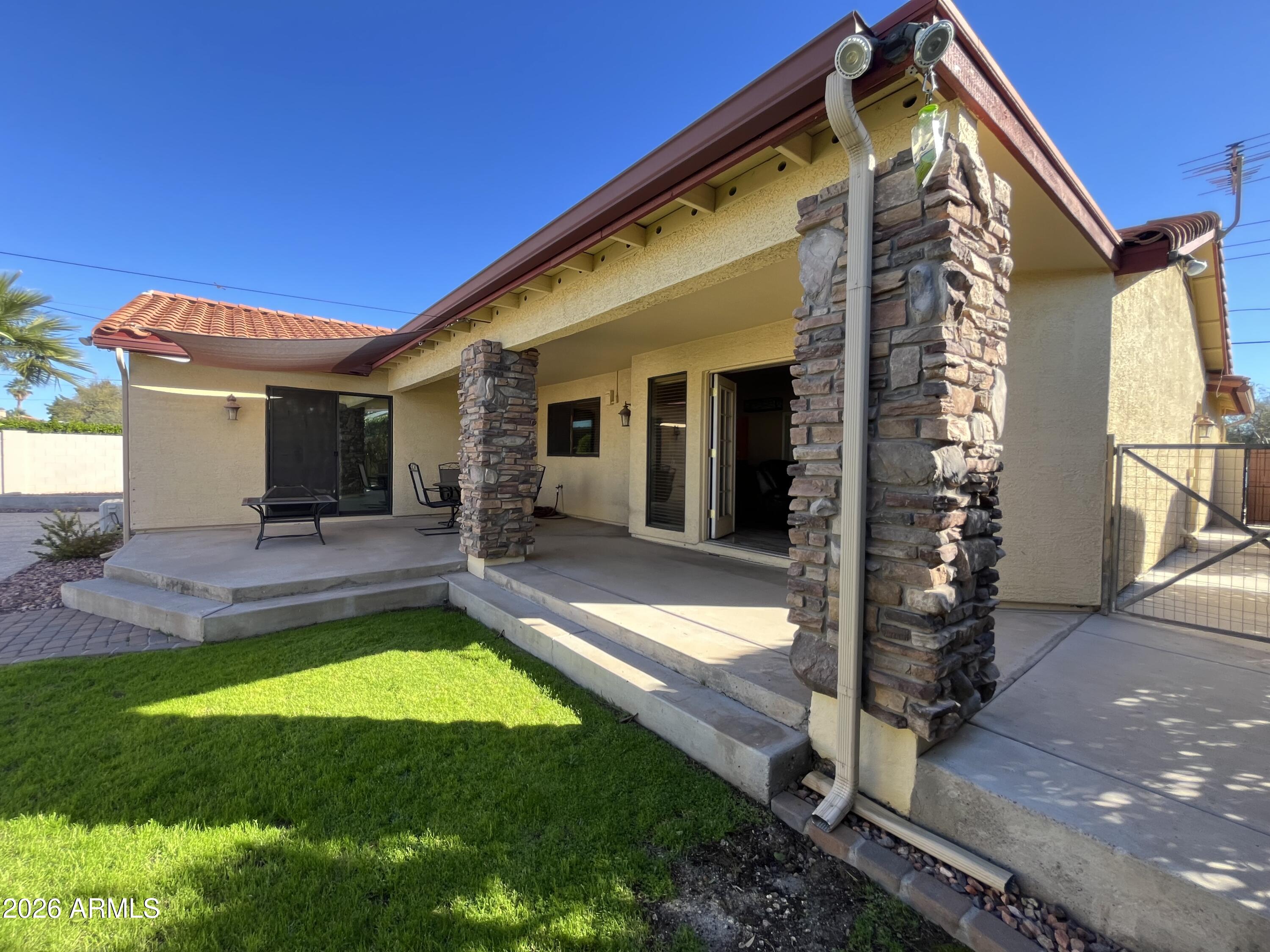 802 East Roberts Road Phoenix, AZ 85022 - Photo 27 of 33 a view of house with swimming pool outdoor seating