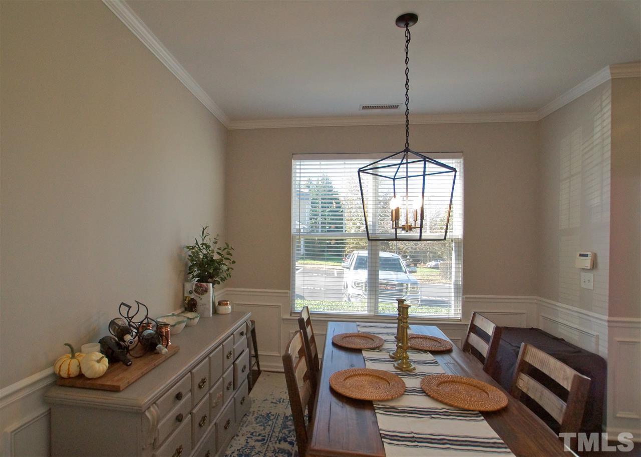 4807 Sir Duncan Way Raleigh, NC 27612 - Photo 17 of 29 a living room with furniture