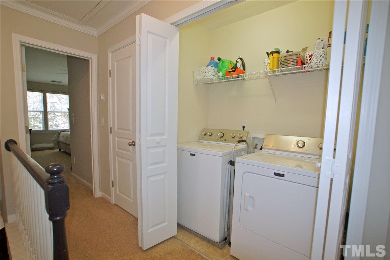 4807 Sir Duncan Way Raleigh, NC 27612 - Photo 20 of 29 a utility room with dryer and washer