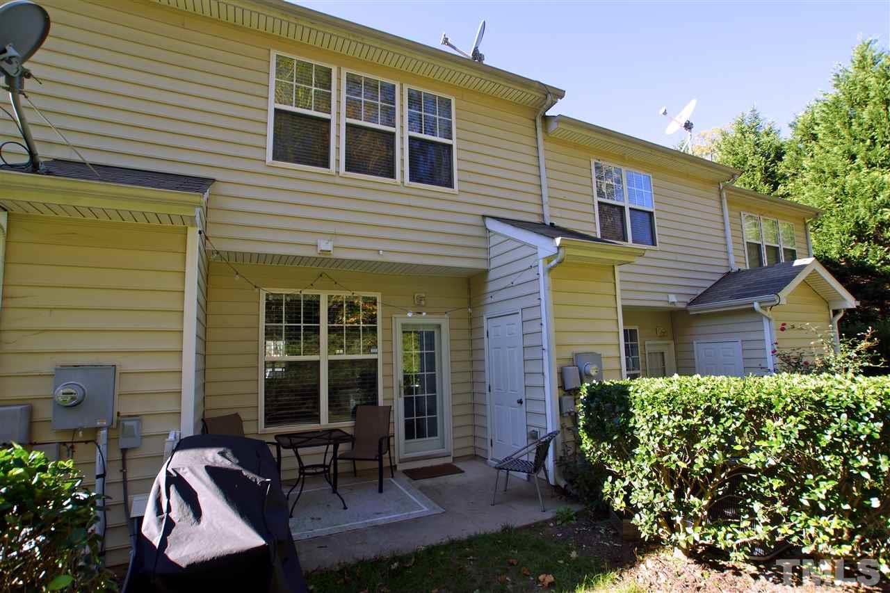 4807 Sir Duncan Way Raleigh, NC 27612 - Photo 28 of 29 a backyard of a house with seating space