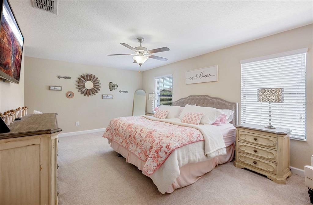 17365 Old Tobacco Road Lutz, FL 33558 - Photo 22 of 44 a bedroom with a bed and a window