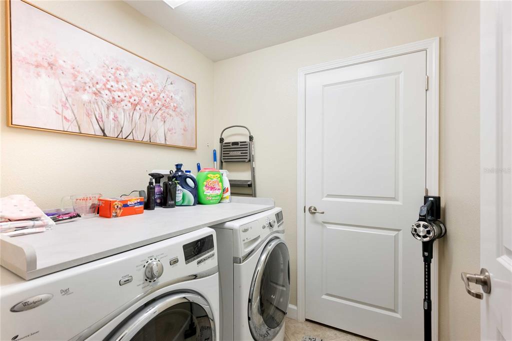 17365 Old Tobacco Road Lutz, FL 33558 - Photo 30 of 44 a utility room with dryer and washer