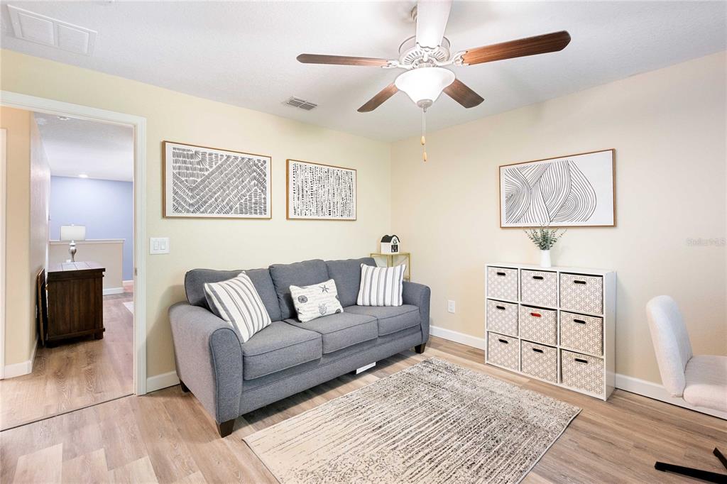 17365 Old Tobacco Road Lutz, FL 33558 - Photo 32 of 44 a living room with furniture and a couch