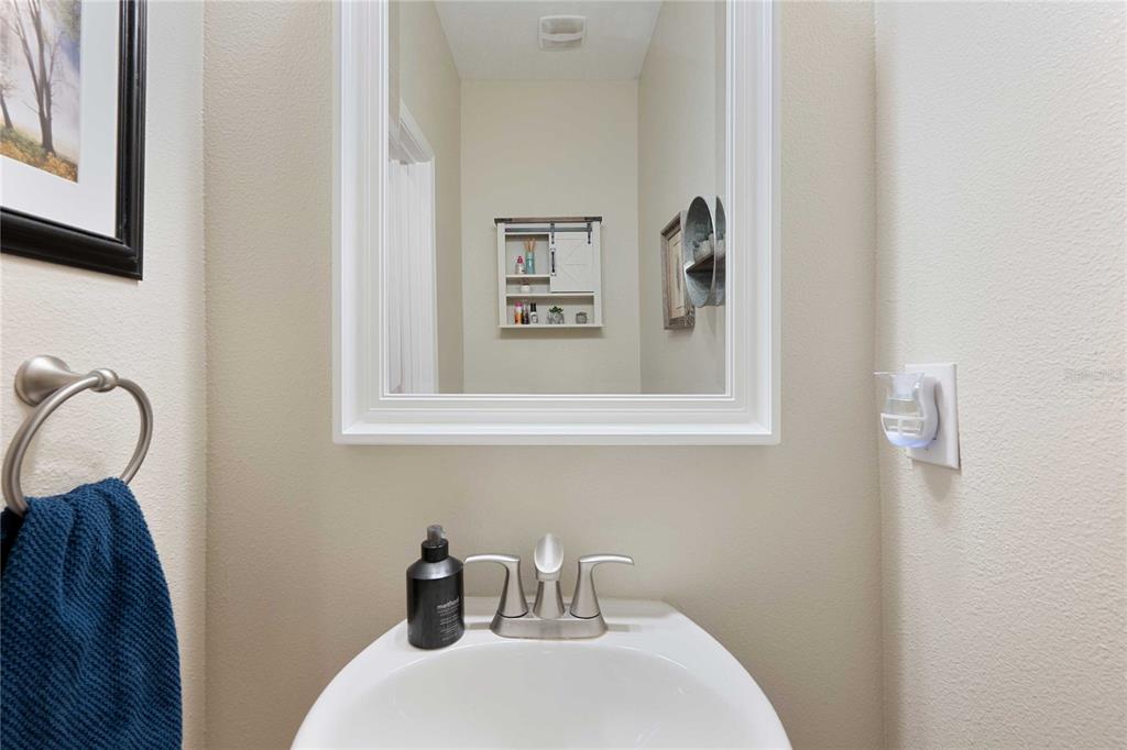 17365 Old Tobacco Road Lutz, FL 33558 - Photo 37 of 44 a bathroom with a sink a mirror and a window