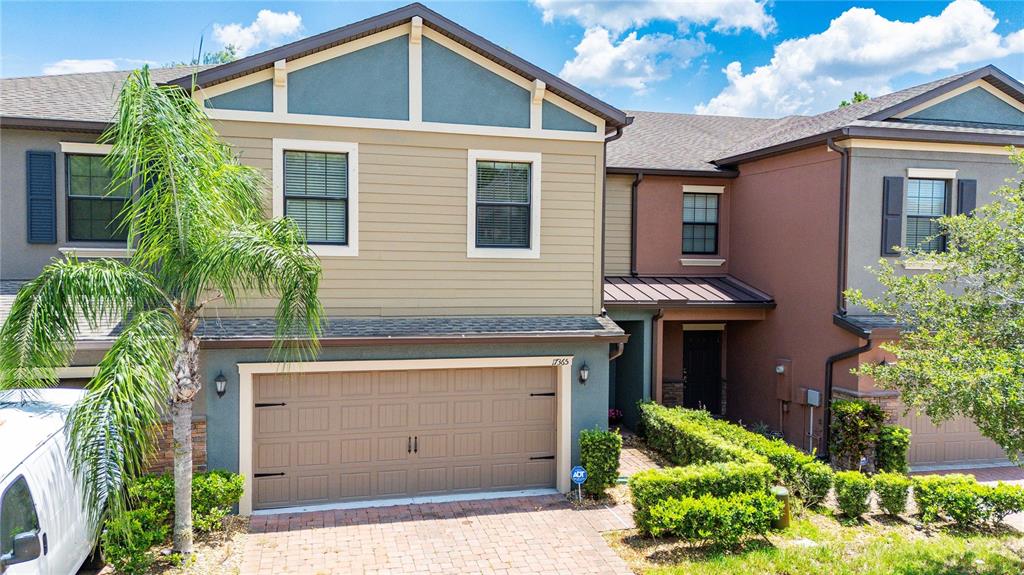 17365 Old Tobacco Road Lutz, FL 33558 - Photo 40 of 44 a front view of a house with a yard