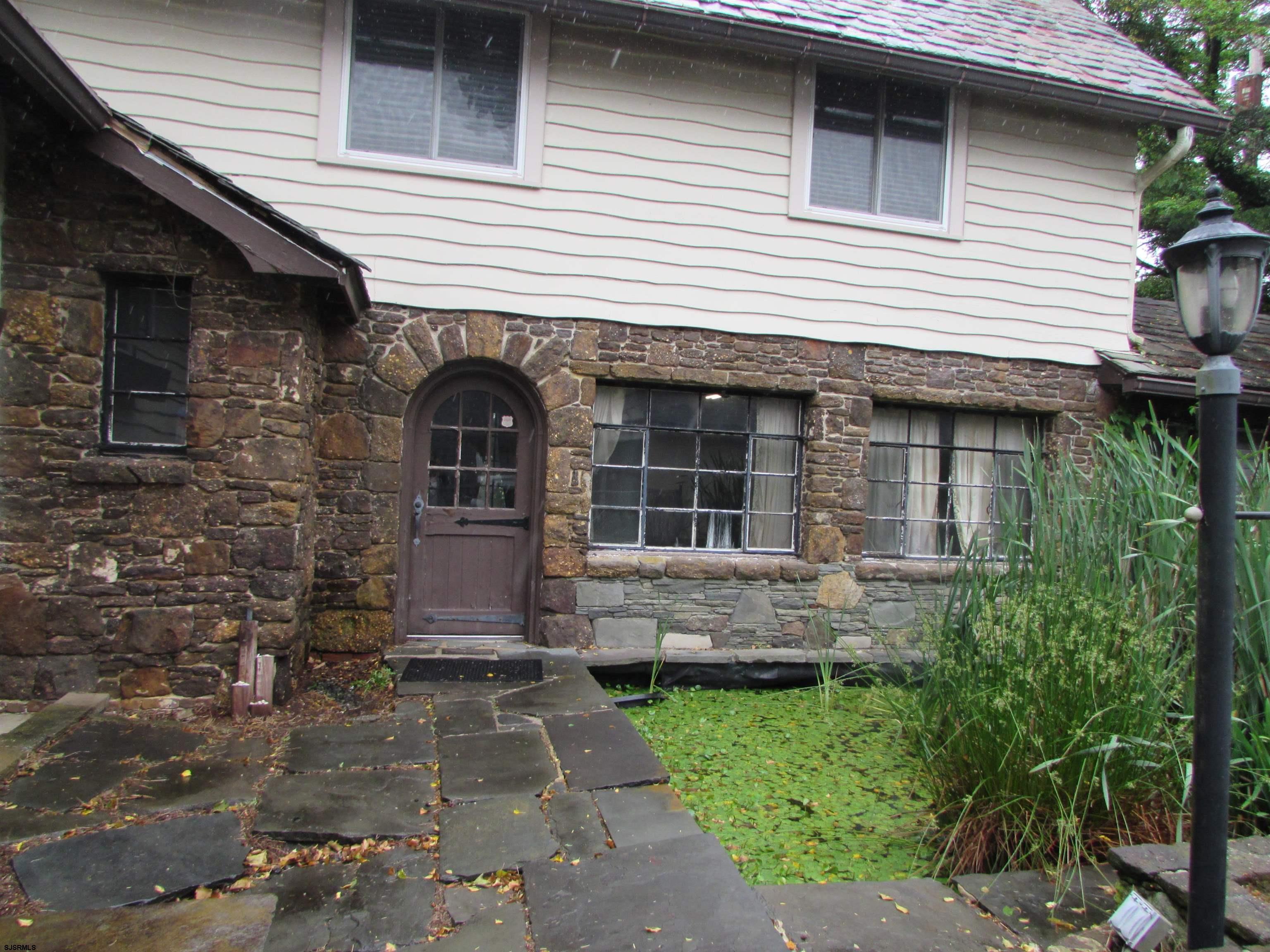 744 Shore Road Linwood, NJ 08221 - Photo 3 of 43 a front view of a house with garden