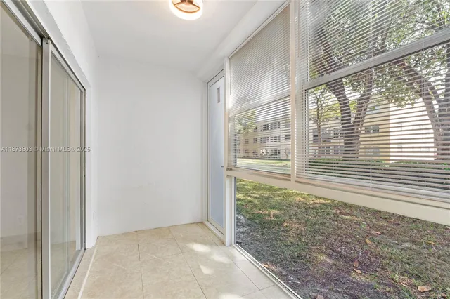 a view of a room that has a window in it