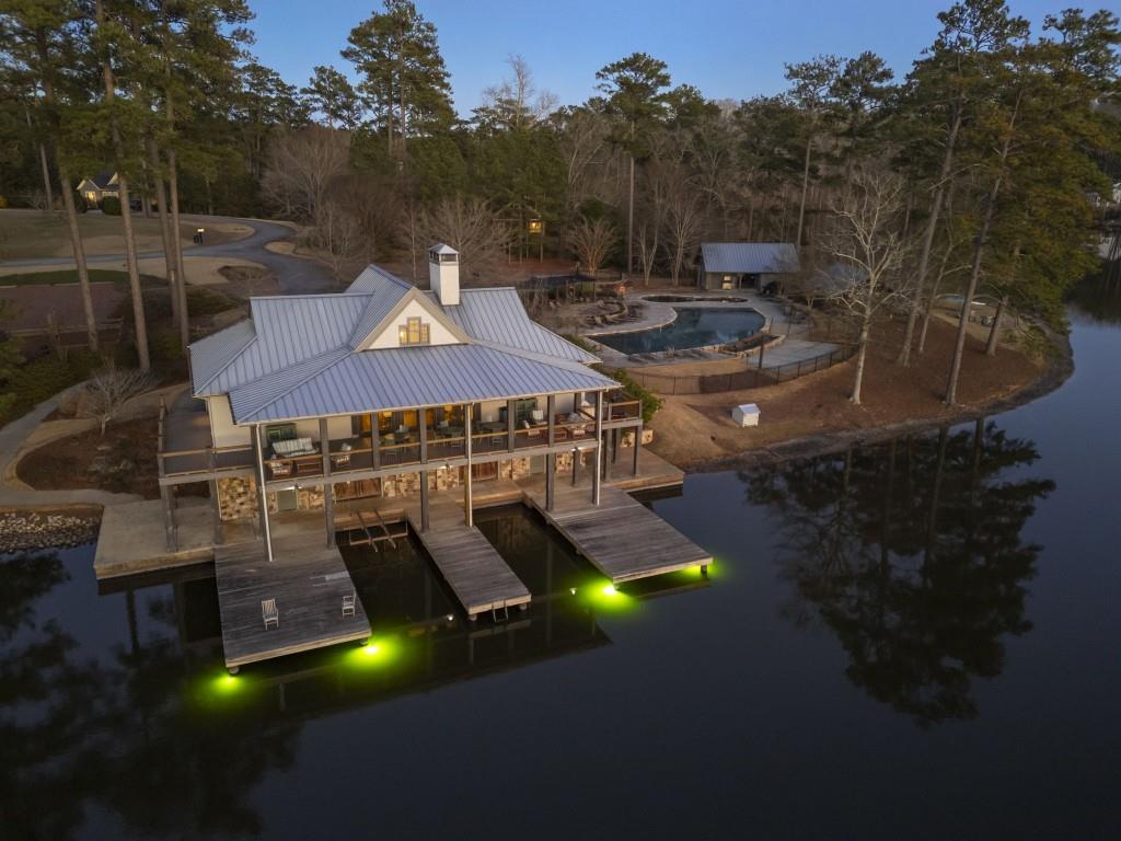 72 Buckeye Ridge Newnan, GA 30263 - Photo 56 of 80 a aerial view of a house with swimming pool and big yard