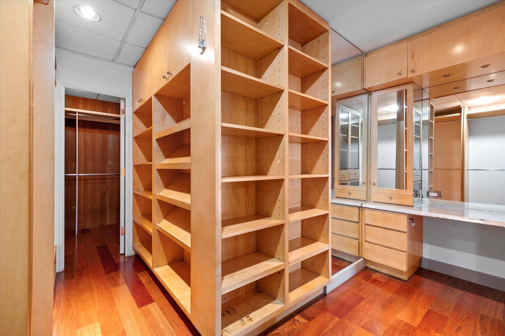 200 Old Palisade Road, Unit PH 4/5 Fort Lee, NJ 07024 - Photo 16 of 46 a view of walk in closet with empty racks