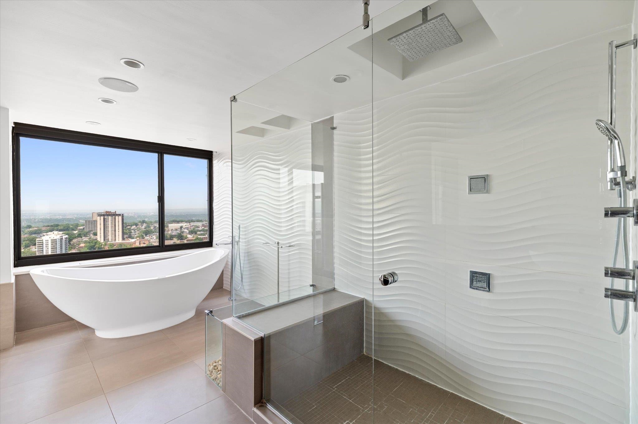 200 Old Palisade Road, Unit PH 4/5 Fort Lee, NJ 07024 - Photo 20 of 46 a bathroom with a bathtub and a sink