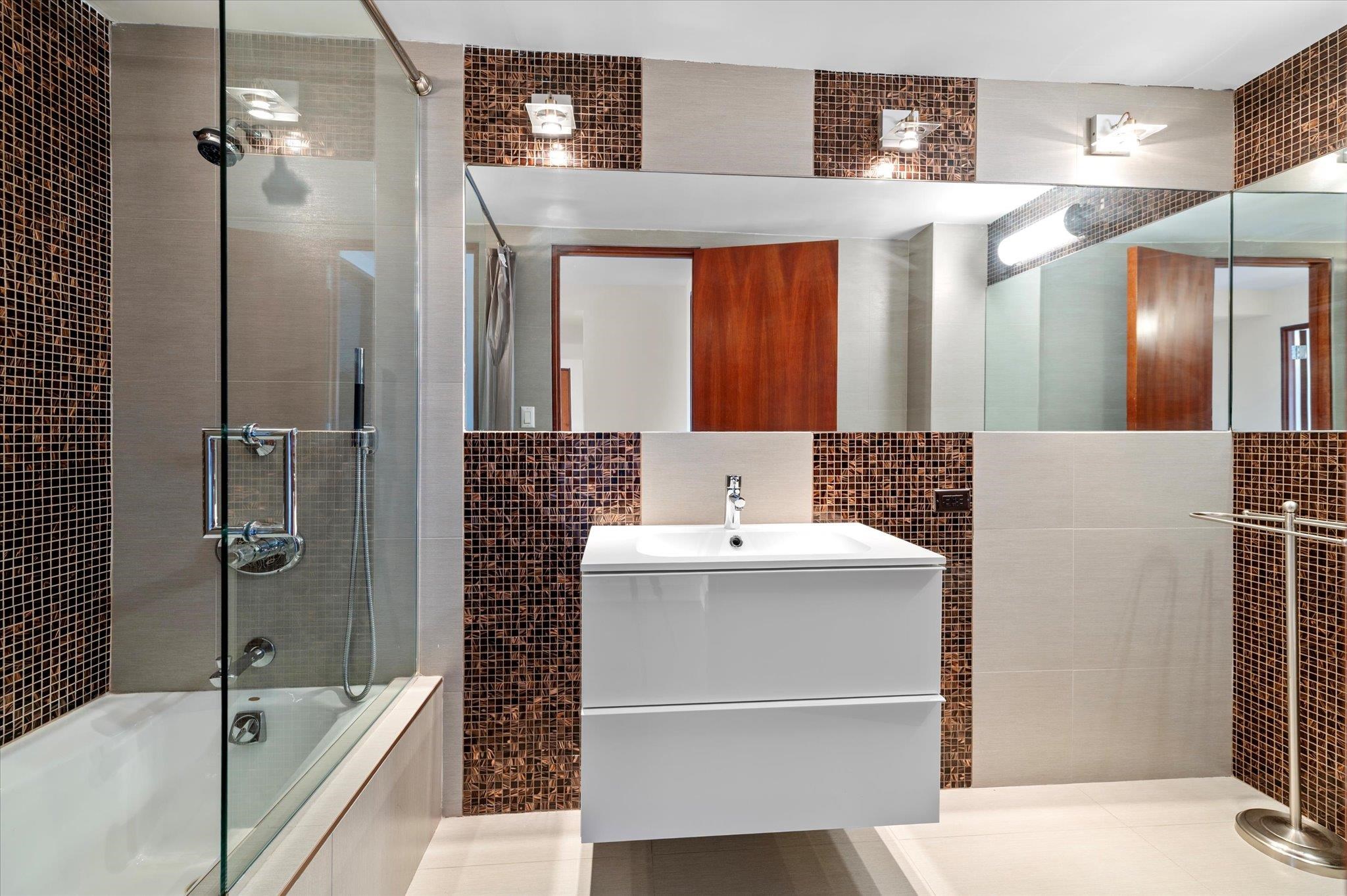 200 Old Palisade Road, Unit PH 4/5 Fort Lee, NJ 07024 - Photo 33 of 46 a bathroom with a bathtub and shower