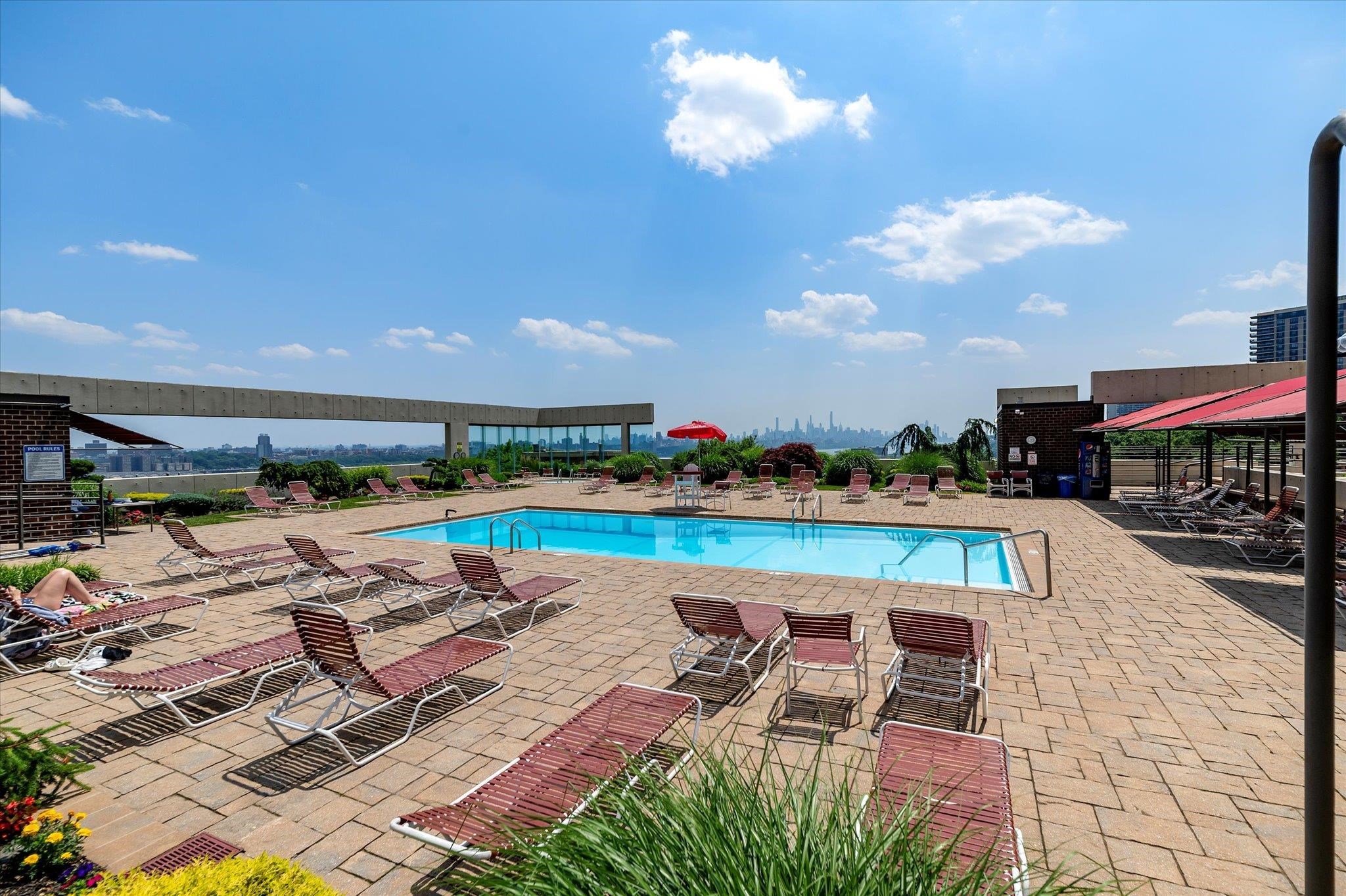 200 Old Palisade Road, Unit PH 4/5 Fort Lee, NJ 07024 - Photo 43 of 46 a view of swimming pool with outdoor seating