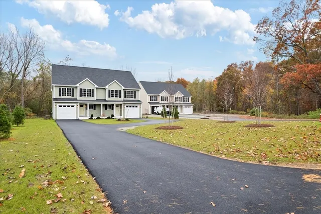 a view of house with a swimming pool