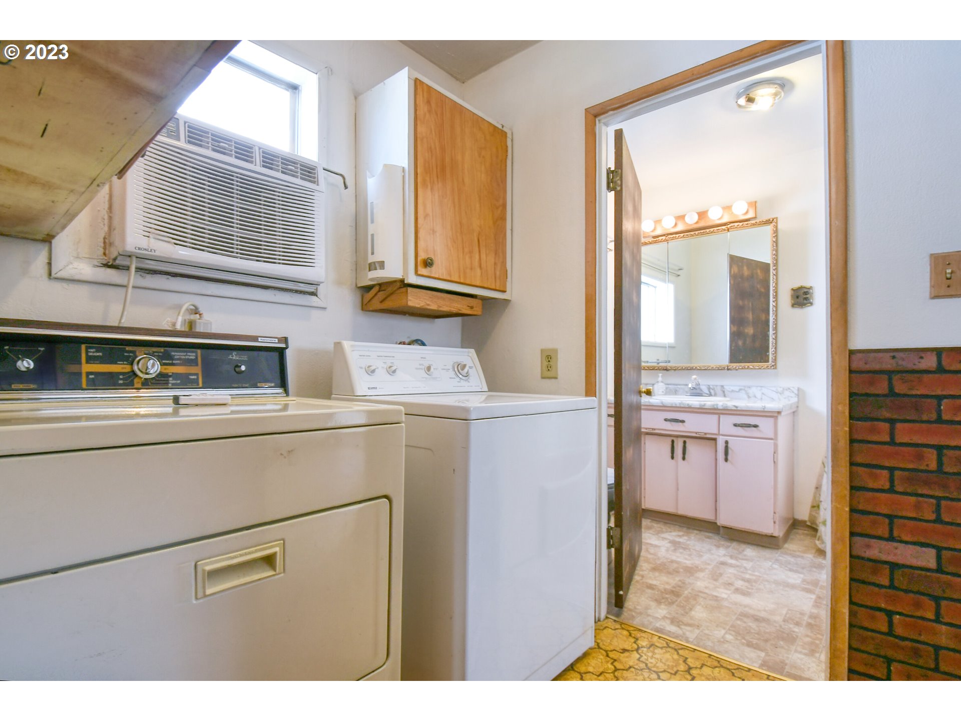 617 Southwest 5th Street Pendleton, OR 97801 - Photo 17 of 29 a kitchen with a refrigerator and a stove