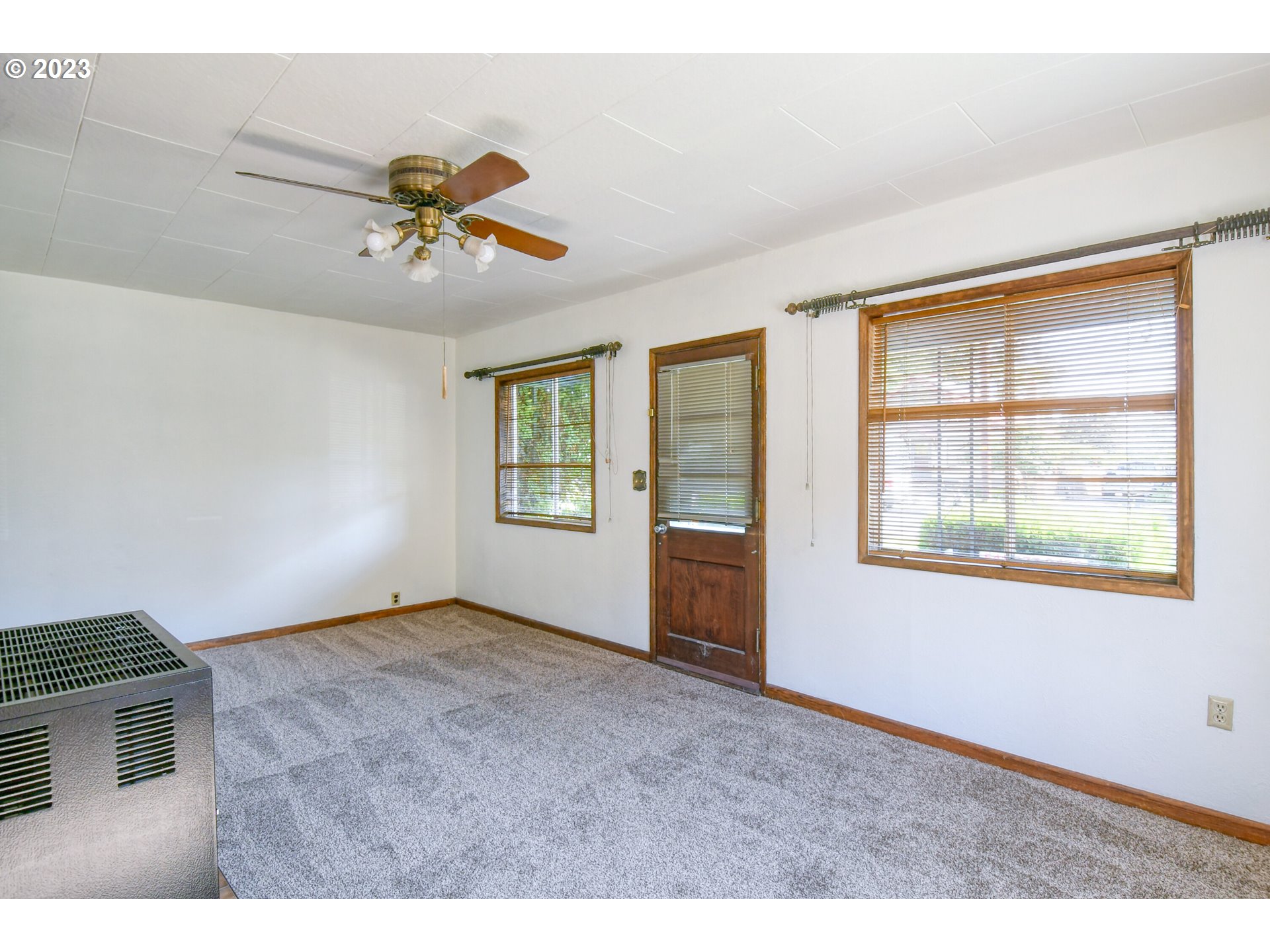 617 Southwest 5th Street Pendleton, OR 97801 - Photo 4 of 29 a view of an empty room with a window