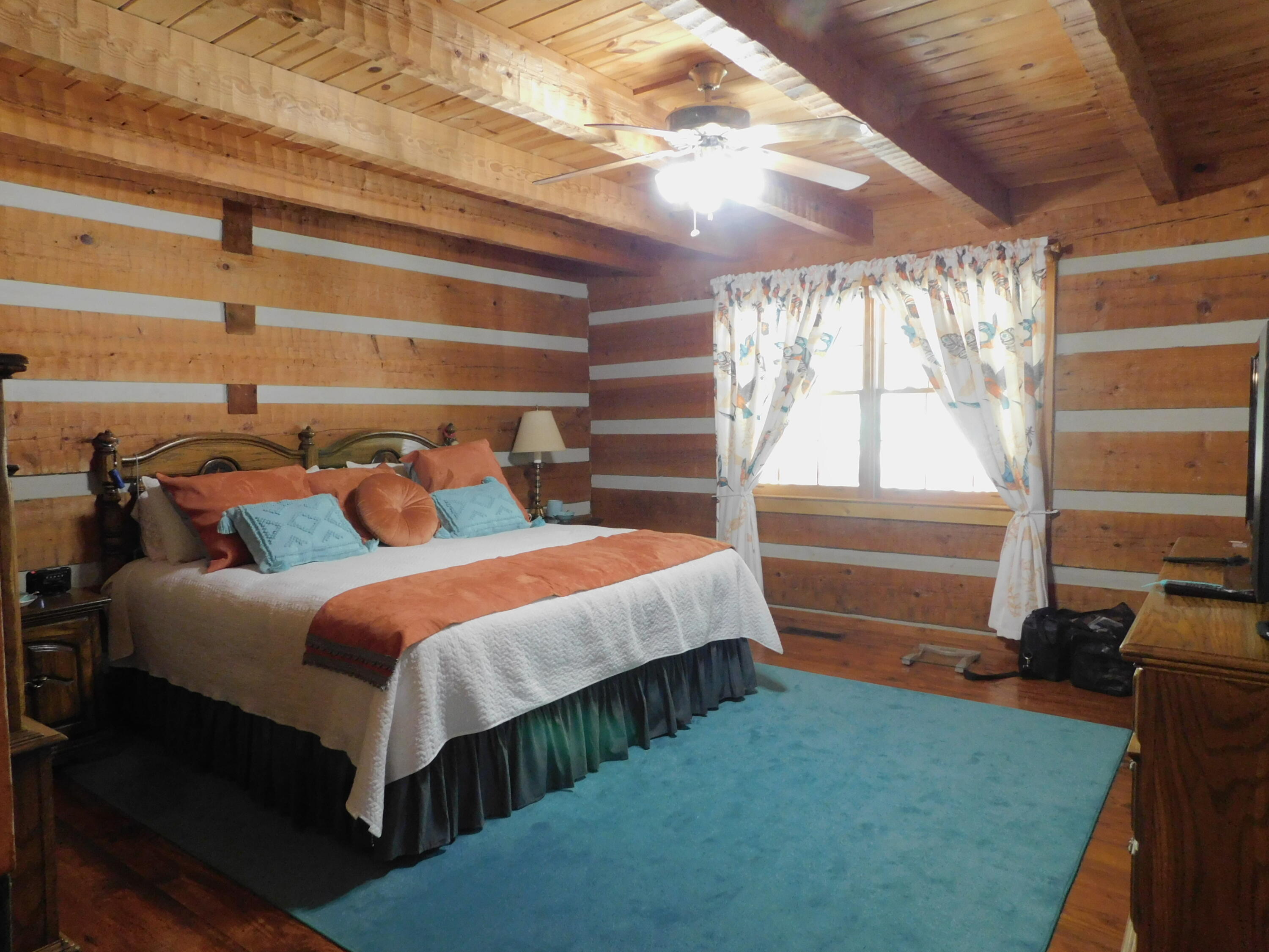 25278 Hidden Forest Lane Andalusia, AL 36421 - Photo 22 of 35 a bedroom with a bed and a window