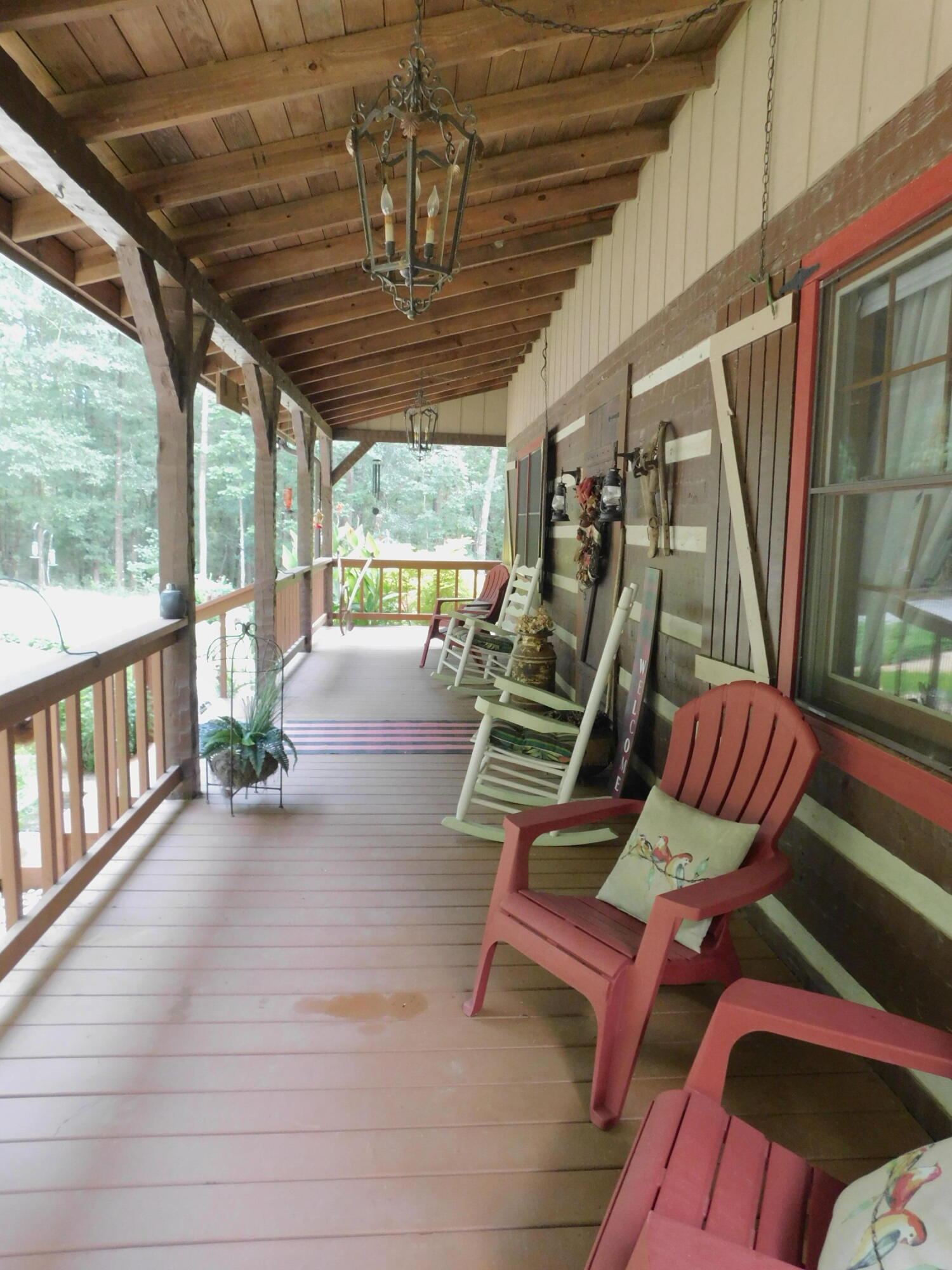 25278 Hidden Forest Lane Andalusia, AL 36421 - Photo 3 of 35 a view of front door with outdoor seating